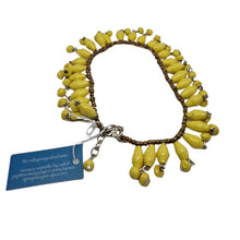 Afbeelding in Gallery-weergave laden, Enkelbandje Oeganda met bedels Paars of Geel