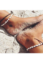 Afbeelding in Gallery-weergave laden, Enkelbandje met spiraal schelpen en bruin koord