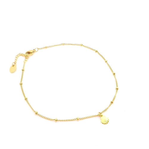 fijn gouden enkelbandje met kleine balletjes en een klein schelpje. Fine jewelry fijne sieraden 