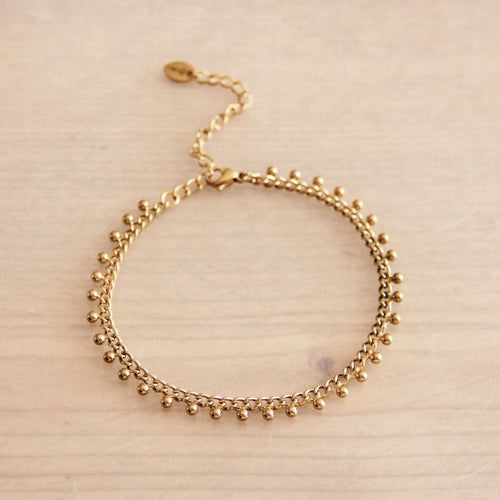 Gouden armband met balletjes van roestvrij staal